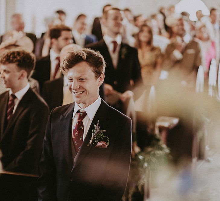 Groom at the Altar  in Henry Herbert Tailors Suit | English Country Garden Marquee Wedding at the Family Home on the Isle of Wight | Jason Mark Harris Photography