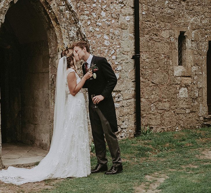 Bride in Lace Rime Arodaky Wedding Dress | Groom in Henry Herbert Tailors Suit | English Country Garden Marquee Wedding at the Family Home on the Isle of Wight | Jason Mark Harris Photography