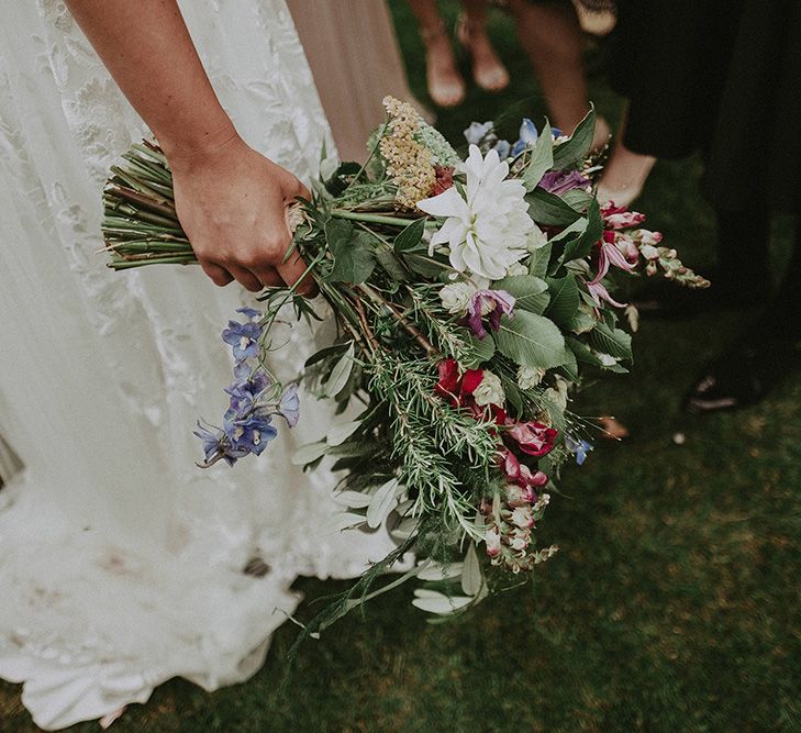 Wild Flower Bouquet | Bride in Lace Rime Arodaky Wedding Dress | English Country Garden Marquee Wedding at the Family Home on the Isle of Wight | Jason Mark Harris Photography