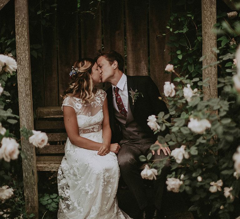 Bridesmaid in Lace Rime Arodaky Dress | Groom in Henry Herbert Tailors Suit | English Country Garden Marquee Wedding at the Family Home on the Isle of Wight | Jason Mark Harris Photography