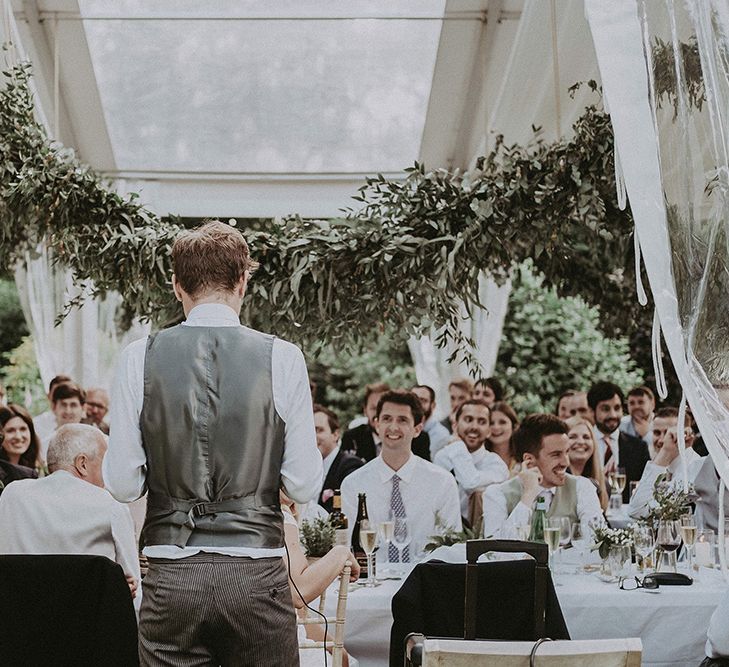 Wedding Reception Speeches | Groom in Henry Herbert Tailors Suit | English Country Garden Marquee Wedding at the Family Home on the Isle of Wight | Jason Mark Harris Photography