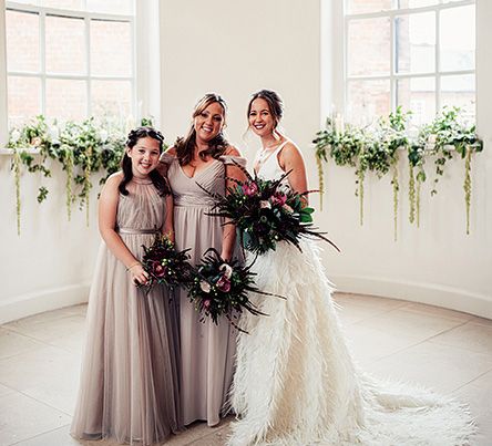 Bridal Party Portrait with Bride in Charlie Brear Payton Bridal Gown &amp; Piora Feather Skirt and Bridesmaids in Dusky Pink Tulle Dresses