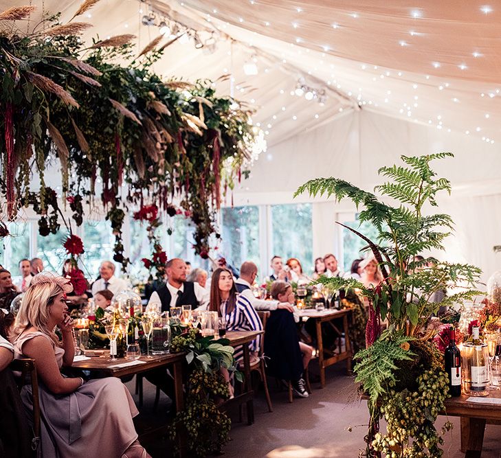 Marquee Reception with Fairy Light Ceiling and Hanging Floral Installation