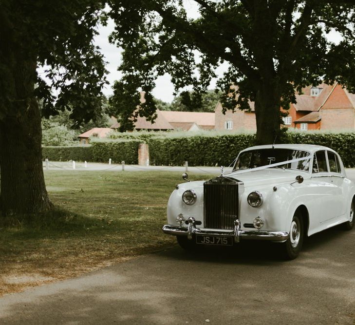 Vintage white Rolls Royce wedding car