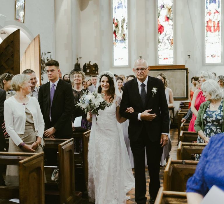 Bride walks up the aisle