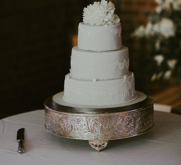 White wedding cake at Ramster Hall in Surrey