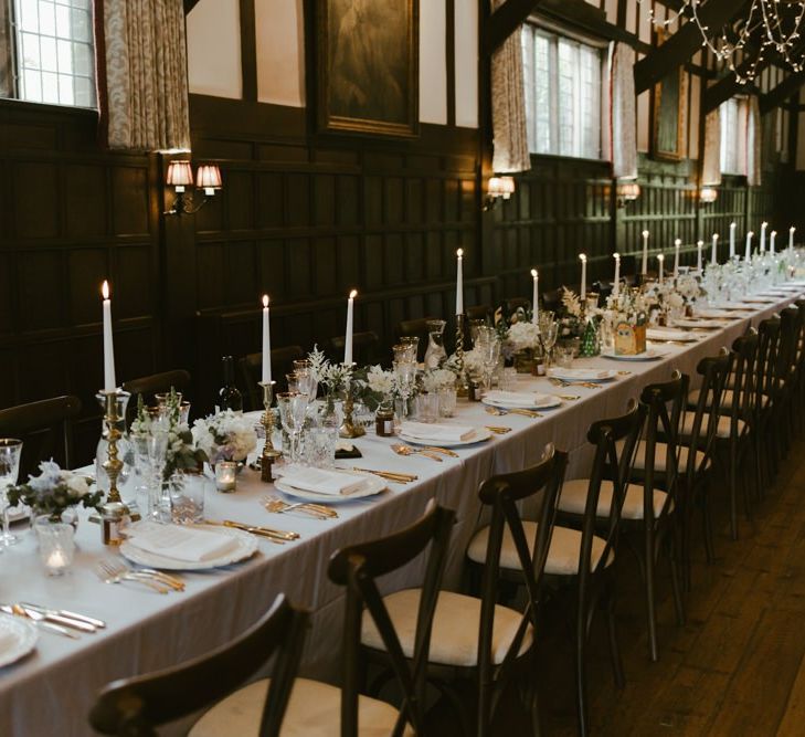 Wedding table decor with flowers and candles at Ramster Hall