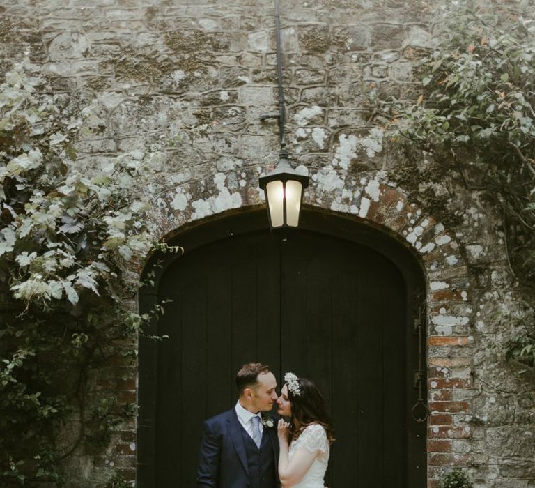 Bride in flower crown with groom