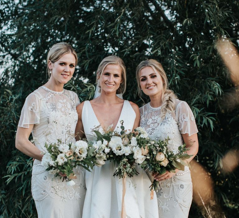 Bridal Party with Bride in Jesus Peiro Wedding Dress and Bridesmaids in White Embellished  Frock and Frill Dresses