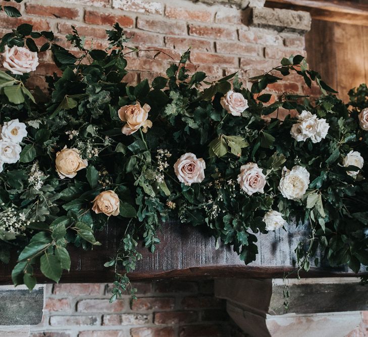 Floral Arrangement of White, Beige and Blush Roses and Foliage