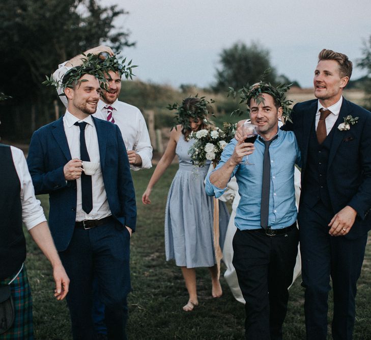 Wedding Guests with Laurel Flower Crowns