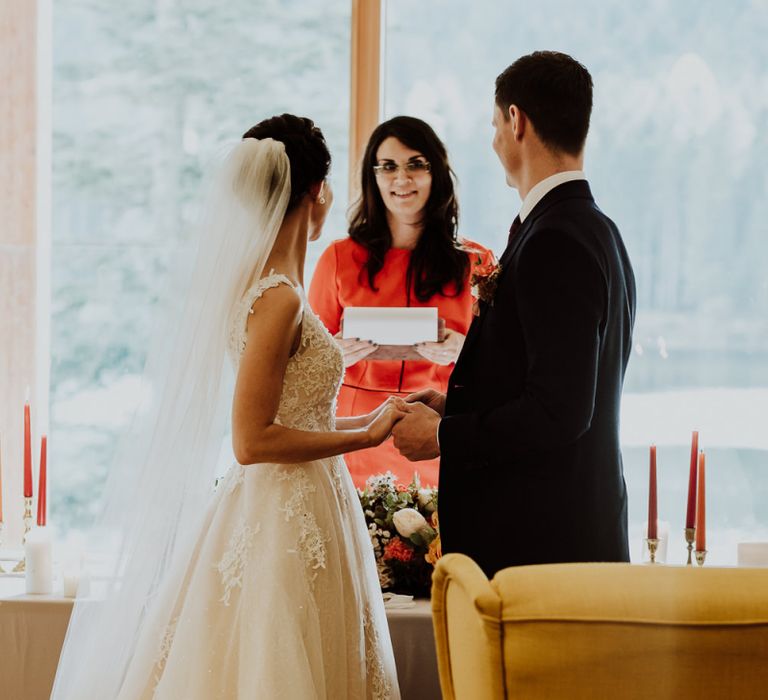 Bride and Groom Exchanging Vows During The Wedding Ceremony