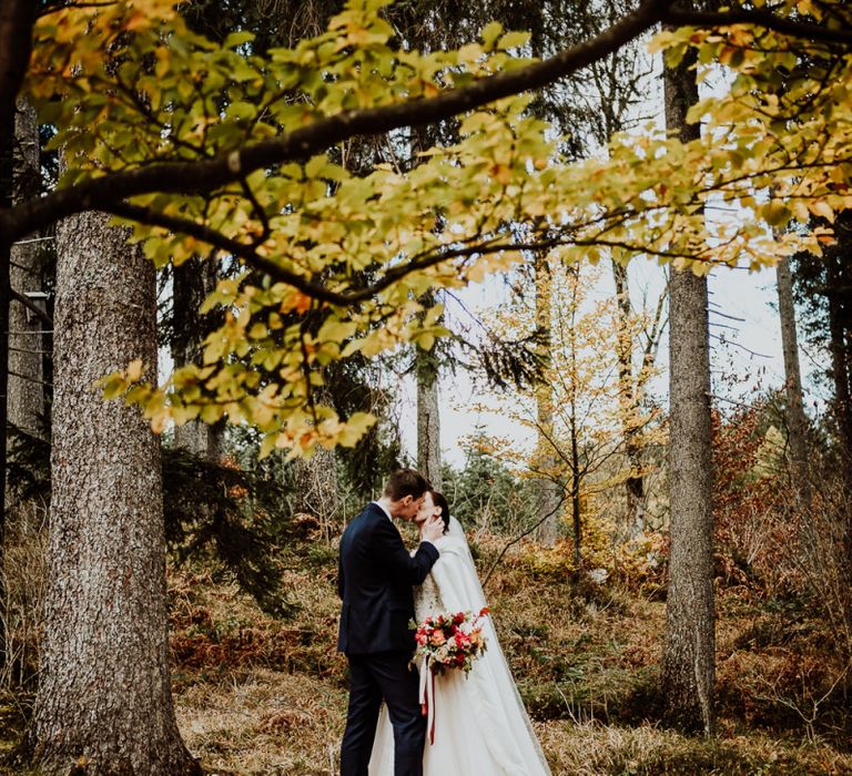 Bride and Groom Portrait Under an Autumnal Tree