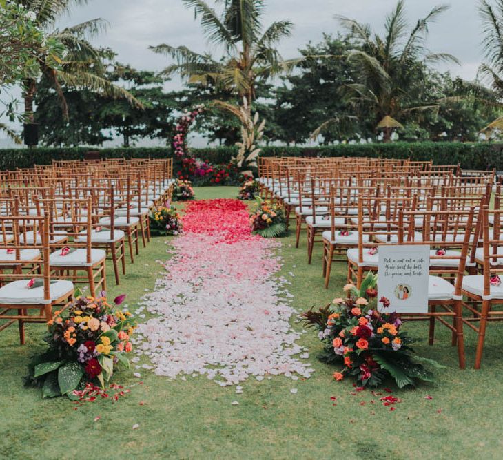 Petals like the aisle for the outdoor ceremony