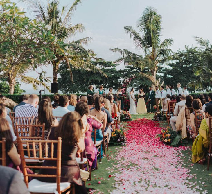 Pink petal aisle at Bali wedding venue