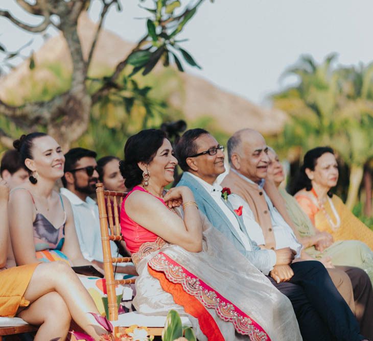 Wedding guests enjoy ceremony at Bali wedding venue