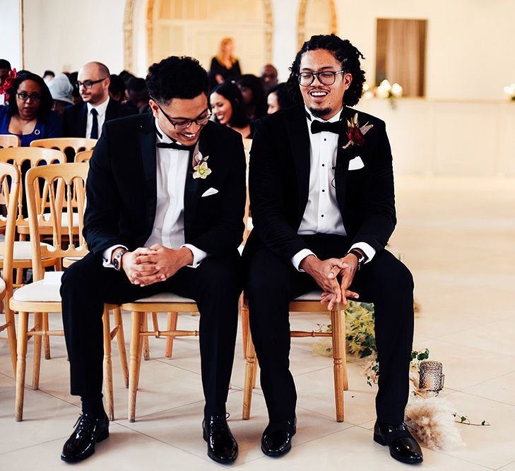 Black Groom and Best Man Waiting at The Altar at Northbrook Park in Tuxedos