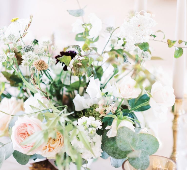 Romantic wedding flower centrepiece and silver votives