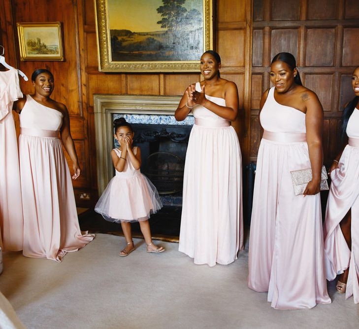 Bridesmaids in Blush Pink One Shoulder Dresses by Vera Wang | Flower Girl in Pink Tutu Dress | Peg Board Table Plan &amp; DIY Sweet Table for an Elmore Court Wedding | Mavric Photography