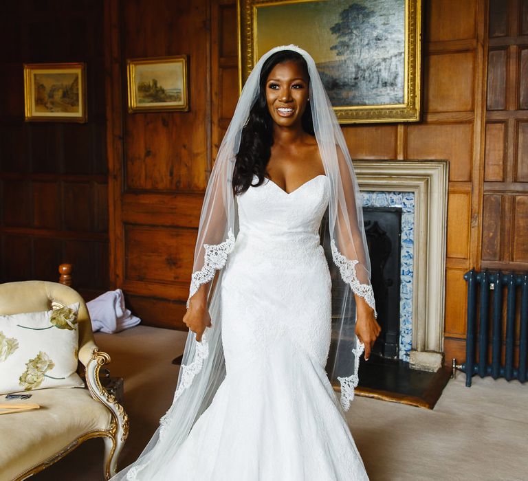 Bride in Lace Fishtail Gown with Strapless Sweetheart Neckline by Suzanne Neville | Lace Edged Cathedral Length Veil | Peg Board Table Plan &amp; DIY Sweet Table for an Elmore Court Wedding | Mavric Photography