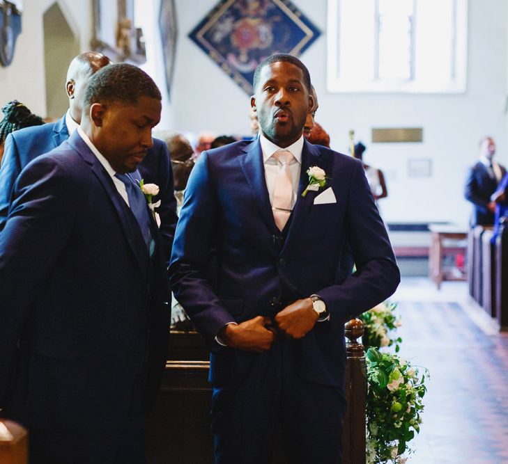 Groom in Blue Three-Piece Ted Baker Suit with Blush Pink Tie | Wedding Ceremony at St John the Baptist Church, Elmore | Peg Board Table Plan &amp; DIY Sweet Table for an Elmore Court Wedding | Mavric Photography