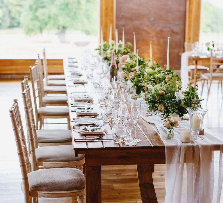 Top Table | Soft White Table Runners | White Tapered Candles | Gold Candlestick Holders | Rose and Peony Centrepieces | Bud Vases | Wedding Reception in The Gillyflower at Elmore Court | Peg Board Table Plan &amp; DIY Sweet Table for an Elmore Court Wedding | Mavric Photography