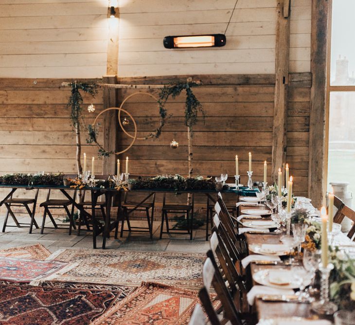 Trestle Table Wedding Reception Tables | Fairy Lights | Taper Candles | Vintage Crockery &amp; Cut Glass | Geometric Wedding Decor &amp; Styling by Locate to Create at The Cherry Barn | Rebecca Carpenter Photography