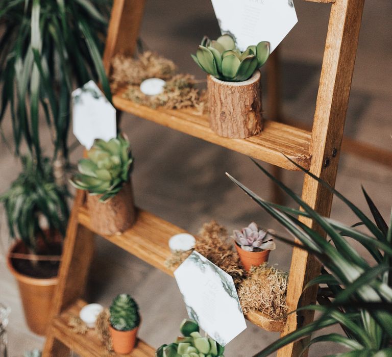 Vintage Step Ladder Table Plan with Hexagonal Table Plan Stationery in Succulent Plant Pot | Geometric Wedding Decor &amp; Styling by Locate to Create at The Cherry Barn | Rebecca Carpenter Photography