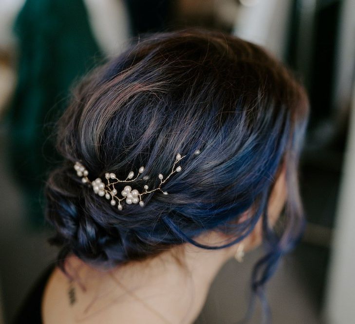 Emerald green bridesmaid dresses with updo and hairpiece