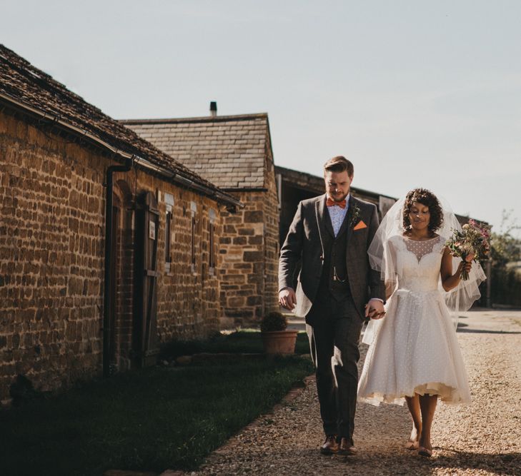 Black Bride in Polka Dot Tea Length Wedding Dress  and Groom in Wool Suit