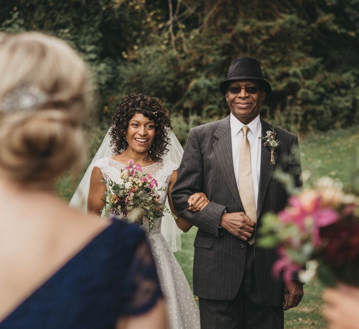 Black Bride and Father of the Bride Approaching the Bridesmaids First Look