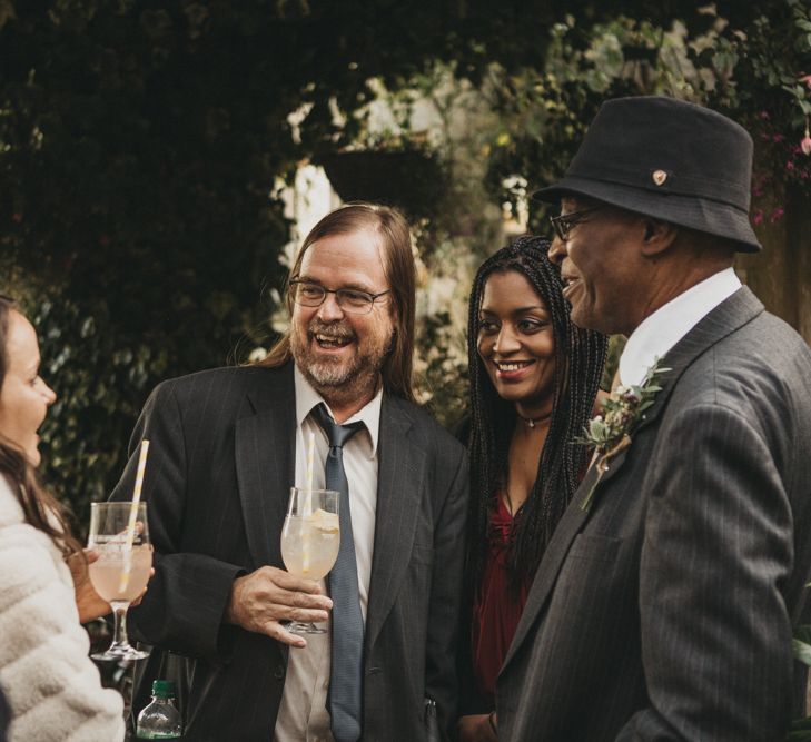 Wedding Guests Laughing During the Drinks Reception