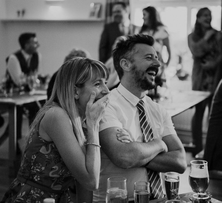 Wedding Guests Laughing During Wedding Speeches