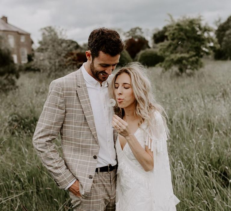 Micro wedding with groom wearing check suit