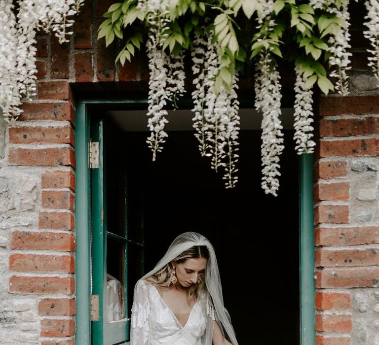 Bride with flower girl at Irish wedding