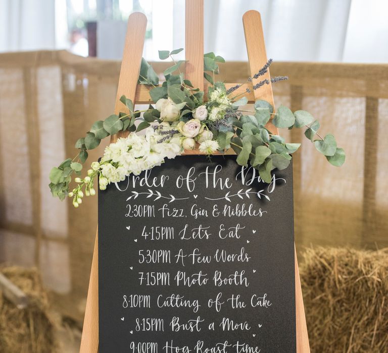 Chalkboard Order Of The Day Sign For Wedding // Sugar Loaf Barn Wedding // Pale Grey Off The Shoulder Bridesmaids Dresses Rewritten // Groom In Harris Tweed // Hog Roast Evening Buffet // Eleanor Jane Photography