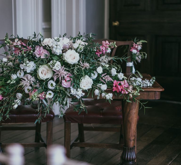 Pink and White Wedding Flower Arrangement for the Registrars Table