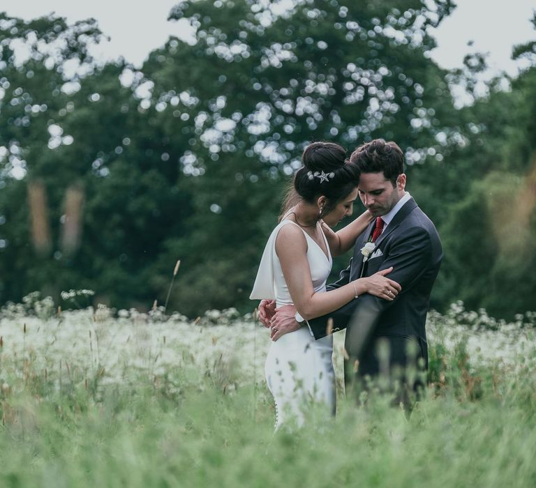 Bride with High Bun and Tilly Thomas Luxe Hair Clips