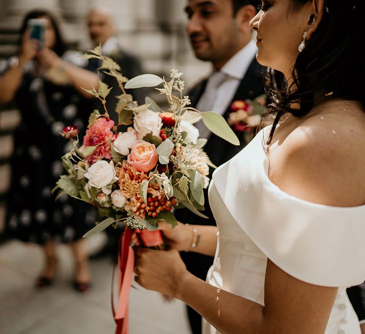 Red, pink and green wedding bouquet