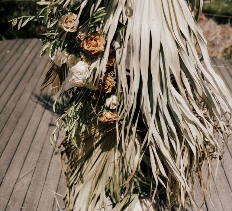 Dried Palm Leaves, Roses and Orchid Wedding Floral Arrangement