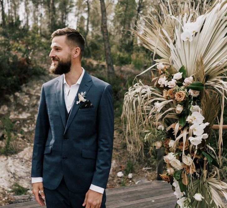 Groom at the Altar at the Outdoor Wedding Ceremony