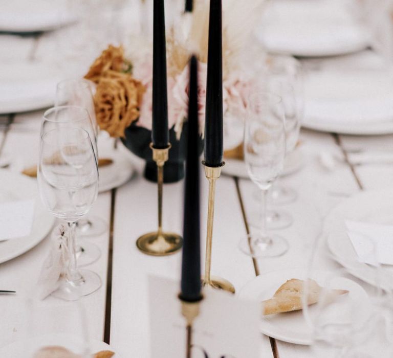 Gold Candlesticks and Black Taper Candles Wedding Decor