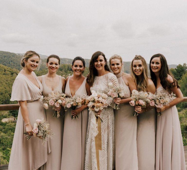 Bridal Party Portrait with Bridesmaids  in Different Blush Show Me Your Mumu Dresses and Bride in Margaux Tardits Wedding Dress