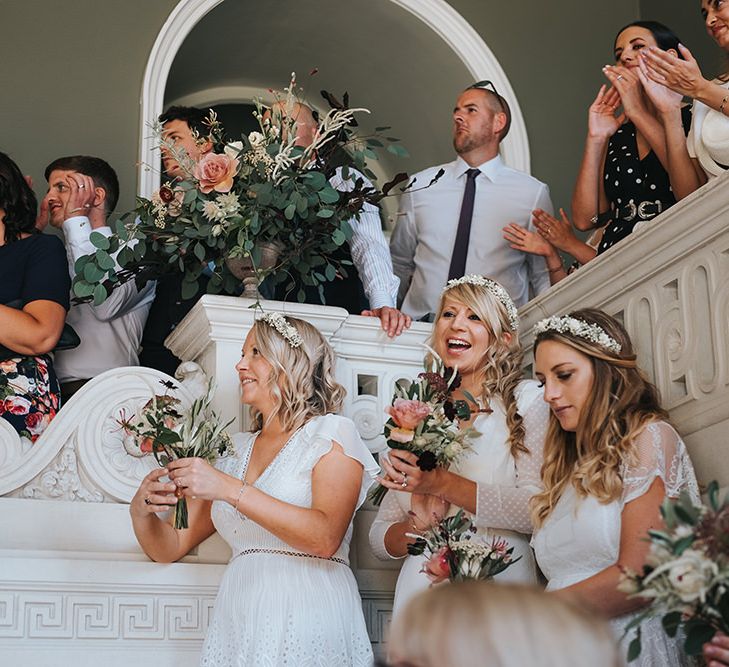 Bridesmaids and Wedding Guests Clapping and Cheering During The Wedding Ceremony at Pynes House, Devon