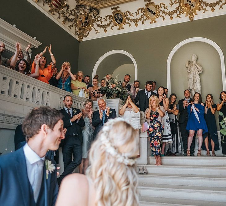 Wedding Guests Clapping and Cheering During The Wedding Ceremony at Pynes House, Devon