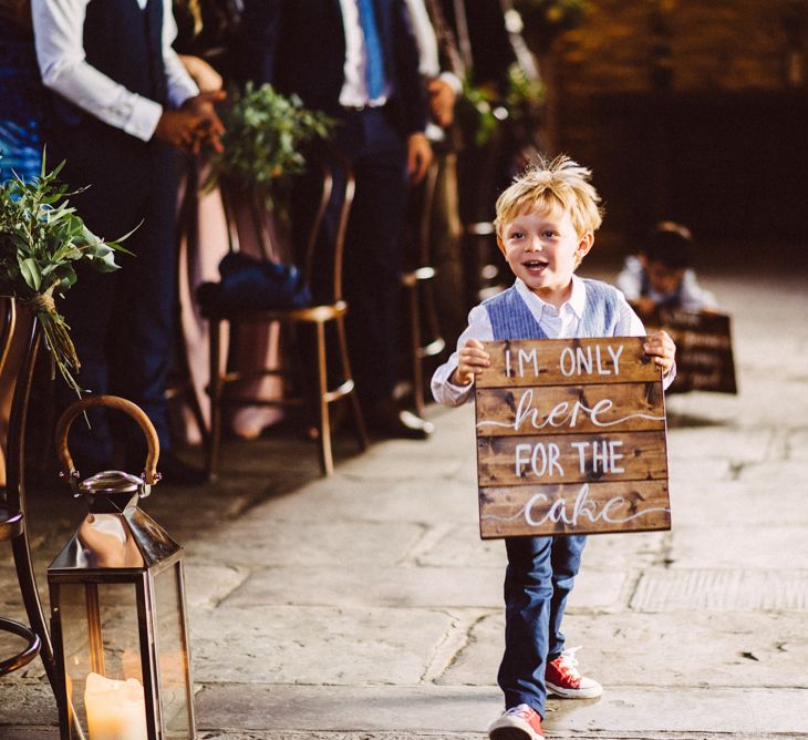 Page Boy With Wooden Sign // Image By Ed Godden