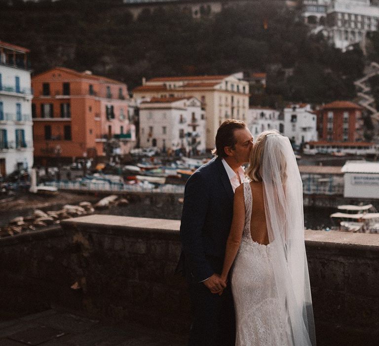 Intimate wedding portrait of bride and groom at the marina of Peters Beach Sorrento