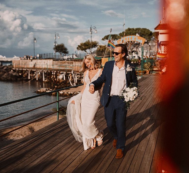 Bride and Groom walking along the marina at Peters Beach Sorrento