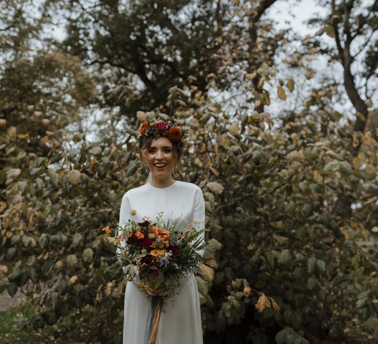 Beautiful Bride in Satin Charlie Bread Wedding Dress, Flower Crown  and Autumnal Wedding Bouquet