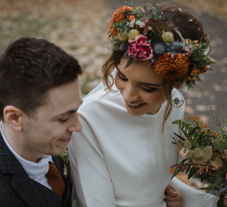 Bride with Orange, Red, Blue and Pink Flower Crown